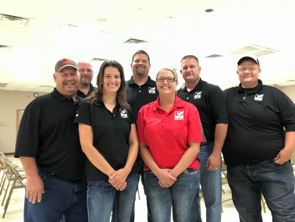 DreamDirt team members pose for a photo