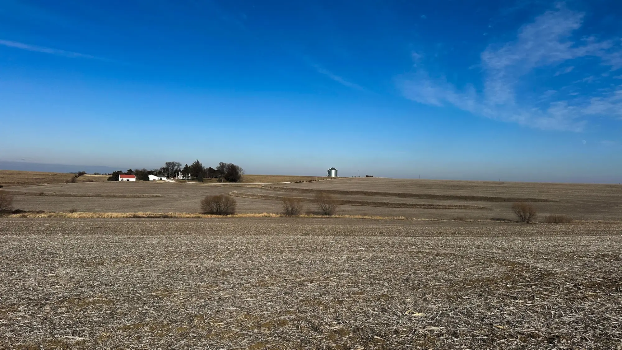 a bird's eye view of farmland in Fremont County, Iowa. The sky is clear.