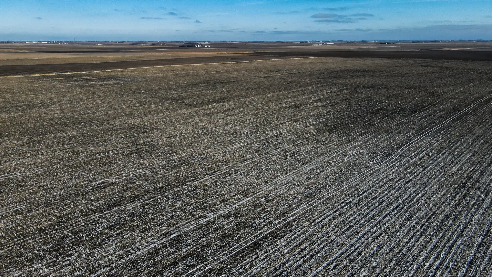 a bird's eye view of farmland in Pocahontas County, Iowa. The sky is clear.