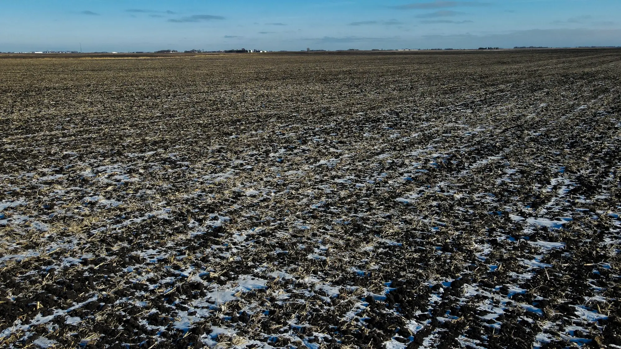 a bird's eye view of farmland in Pocahontas County, Iowa. The sky is clear.